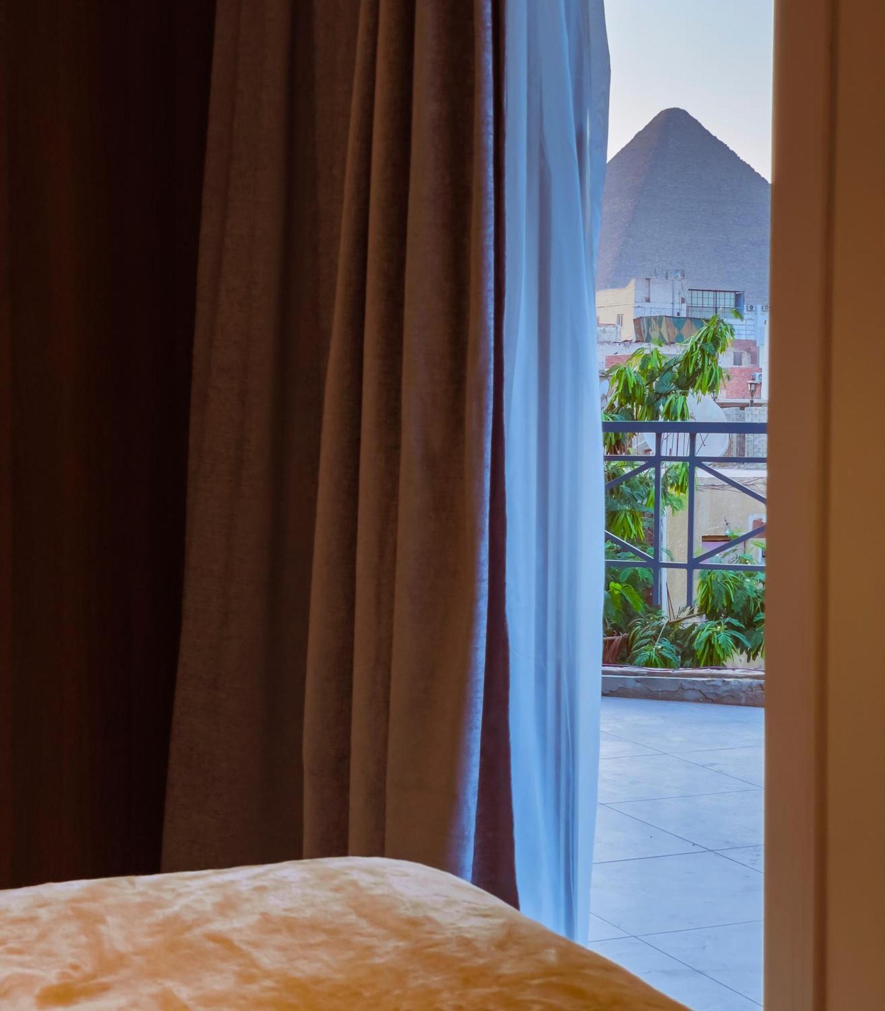 King Khufu Pyramids View Hotel Kafrat al Jabal Quarto foto