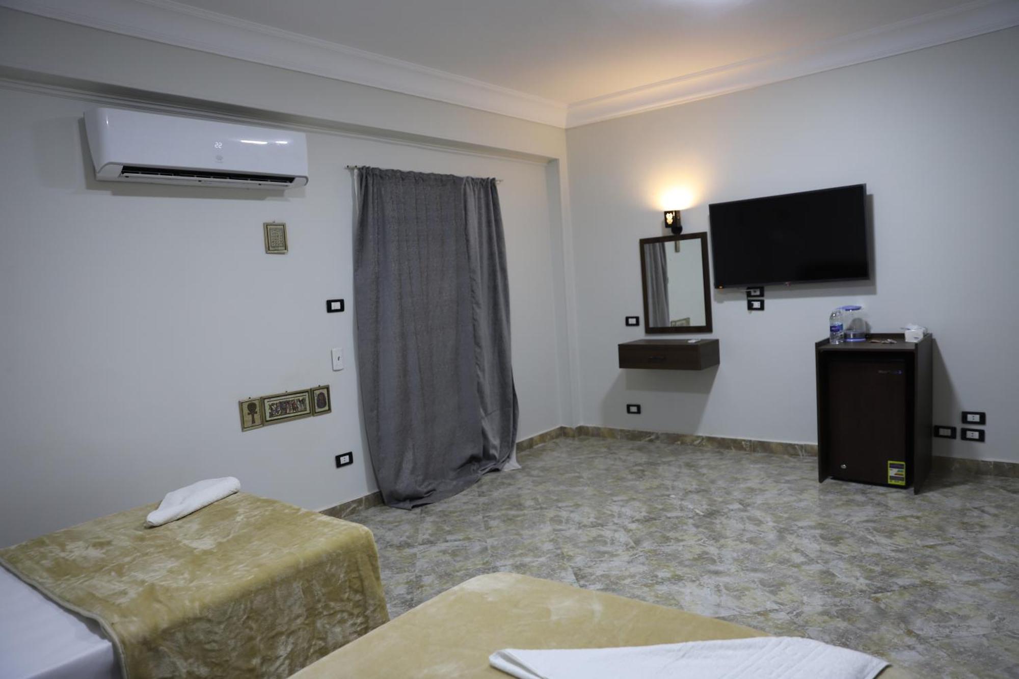 King Khufu Pyramids View Hotel Kafrat al Jabal Quarto foto
